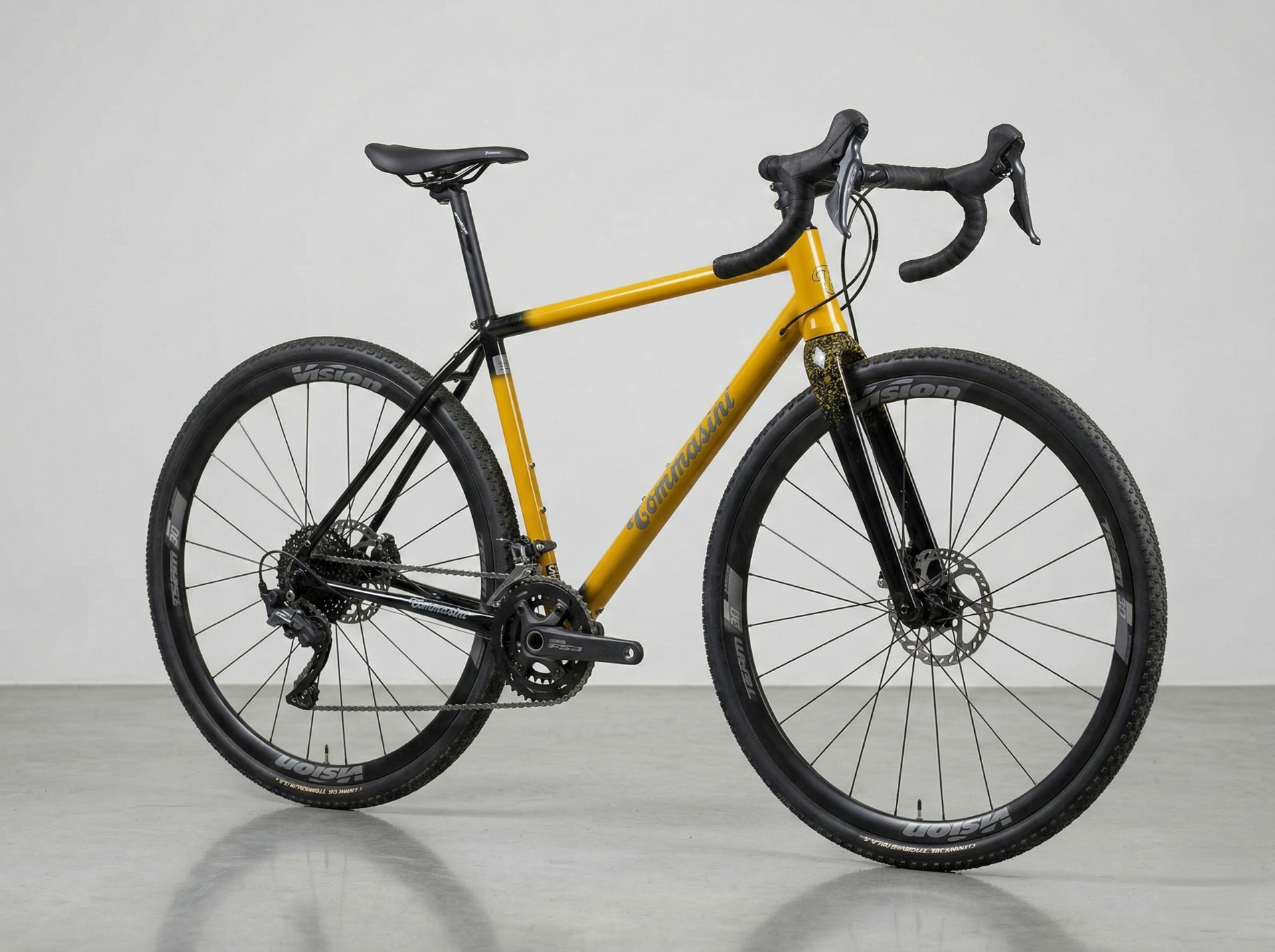 Tommasini Fire collection steel gravel bicycle in warm ochre finish, studio shot